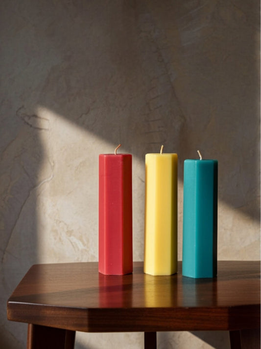 Indiglow hexagonal pillar candle with a geometric shape for decorative arrangements and everyday home decor.